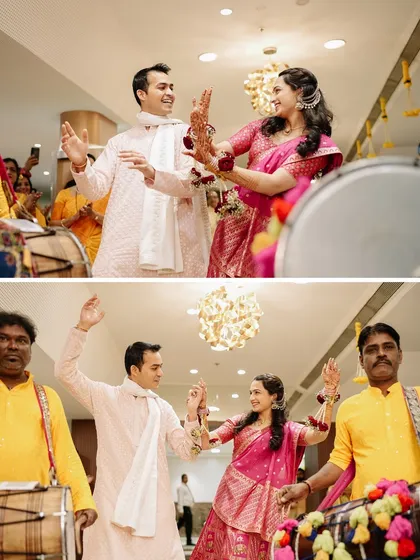 The couple makes a grand entrance to their Haldi ceremony with dhol players, dancing their way into the celebration.