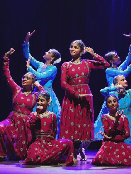 A powerful moment captured during the 'ARAMBH' performance, with me leading my students. This image embodies the guru-shishya parampara, where we share the stage together.