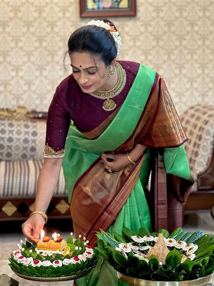 A candid moment of devotion during the festive celebrations.