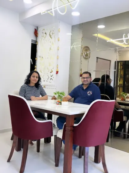 Sharing a meal in the beautiful dining space we created together. These are the moments that make my work so rewarding.