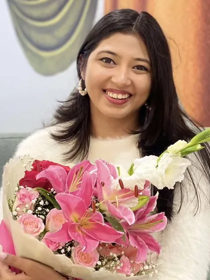 A close-up portrait that captures the heart of our brand. Our goal is to grow, glow, and continue creating gifts filled with love and gratitude.
