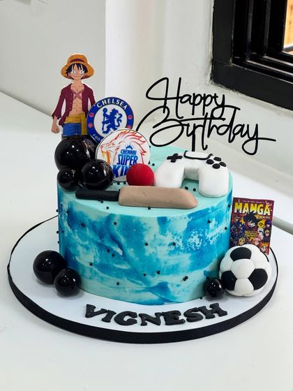 A birthday cake that speaks personality. Crafted for someone who loves anime, football, gaming, and Chelsea FC, this cake brings all their favorites together in one custom design.