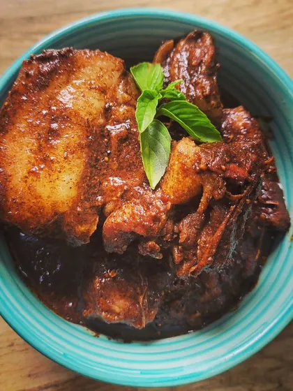 This is my Pork with Perilla Seeds, another Naga favorite. The nutty and earthy flavor of the roasted perilla seed paste creates a thick, dark gravy that pairs perfectly with the rich pork belly.