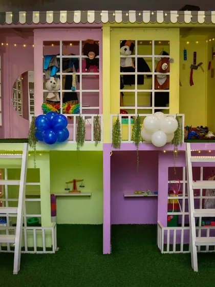 Welcome to our Joy Huts! This multi-level playhouse is the heart of our pretend play zone, offering different rooms and themes for endless imaginative adventures.