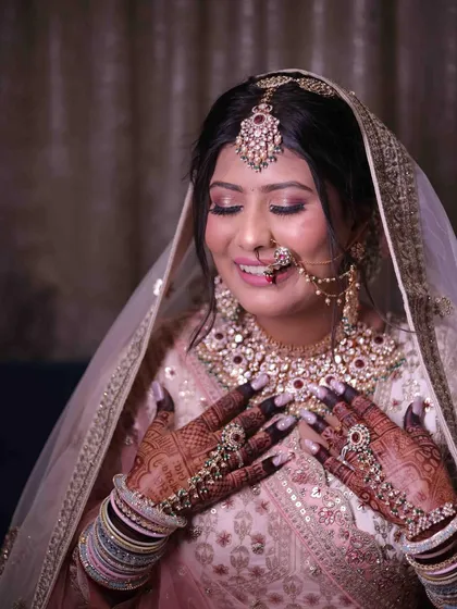 A collection of portraits showing this bride's mesmerizing eyes, dewy skin, and radiant smile, creating the perfect bridal combination.