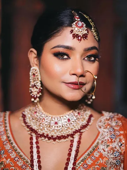 A final portrait of the stunning Nikkah bride. The makeup is bold, beautiful, and designed to last through the entire ceremony and celebration.