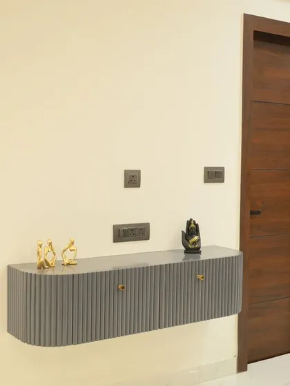 This floating console table is a great way to add storage without taking up floor space. The fluted design and minimal knobs create a modern look that fits perfectly in the entryway.