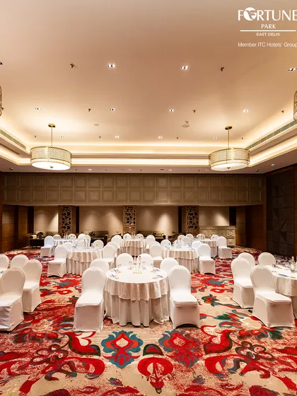 My banquet halls are designed for ultimate flexibility. Here, the space is transformed into a cluster setup for a corporate conference, demonstrating how I can adapt the venue to suit the specific needs of any professional gathering, large or small.