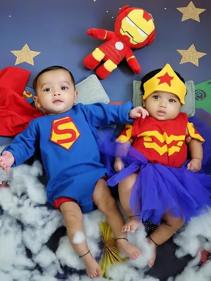 Double the trouble, double the fun! A superhero-themed photoshoot for twins is a fantastic way to showcase their unique personalities while celebrating their incredible bond.