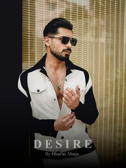 Confidence isn't just worn, it's owned. This shot captures the modern edge and sophisticated attitude of the black and white co-ord set.