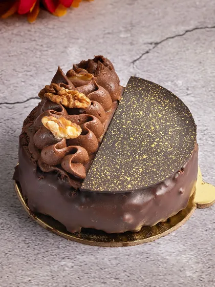 Another angle of the vegan chocolate walnut pastry. I take great care to ensure my vegan desserts are as visually appealing and decadent as my other creations.