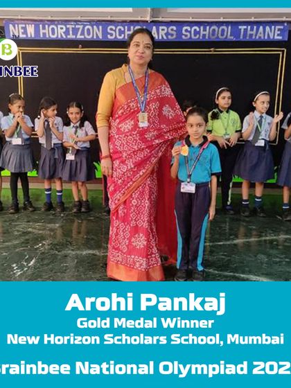 Arohi Pankaj from New Horizon Scholars School, Mumbai, proudly accepts her Gold Medal at the 2023 Olympiad.