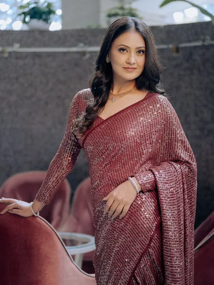 A confident and poised bride, ready for her engagement party.