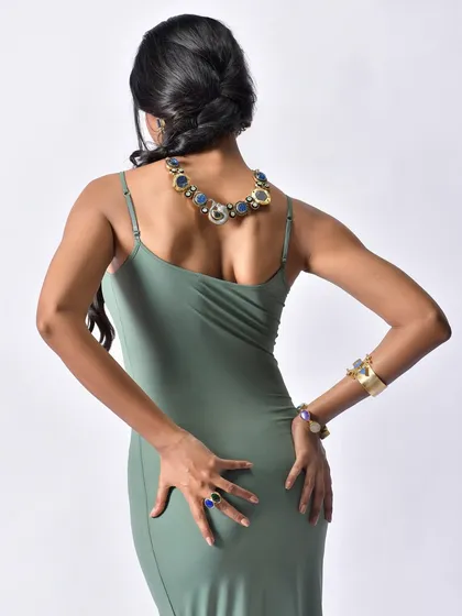 Another angle from the Curiocottage shoot, emphasizing the open-back dress and how the necklace sits, providing a complete 360-degree view for the customer.