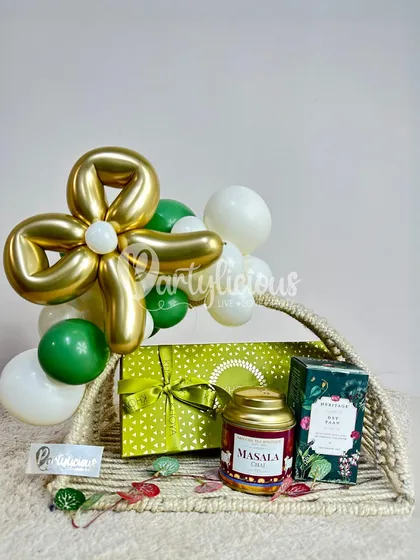 Gift the best to your best. We can style your presents into beautifully curated gift baskets, like this one with a green and gold theme.
