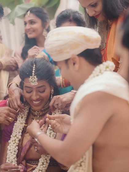 The tying of the 'mangalsutra', a solemn and beautiful moment signifying the couple's lifelong bond.