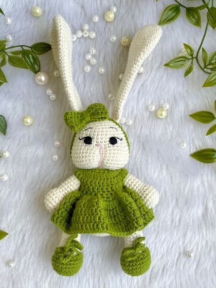 Look at this adorable bunny with her long, floppy ears and sweet green dress! I love when customers have unique ideas, and this long-eared bunny was a joy to bring to life. She is so soft and posable.