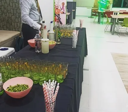 A wide view of the mocktail station at a corporate event, manned by my professional bartenders. I provide all necessary equipment for a full-service beverage counter.
