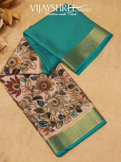 A Mysore silk saree with a chic Kalamkari printed border, offering a modern skirt-like effect when draped.