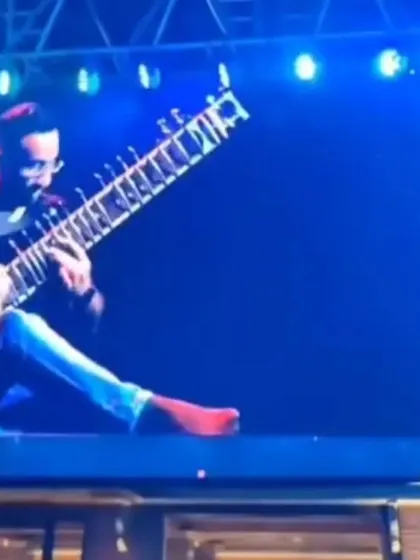 On the big screen during my performance with Farhan Akhtar and Parikrama. My performances are visually engaging for large-scale festival productions.