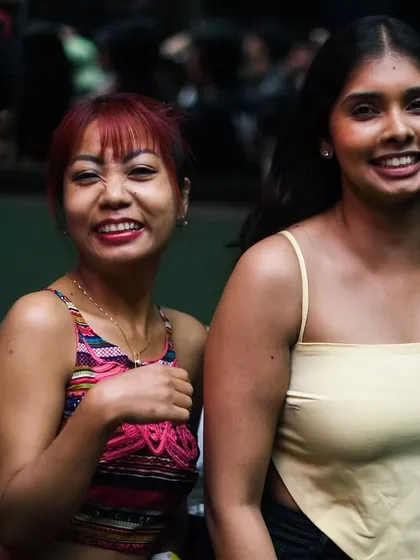 Friends smiling for the camera.