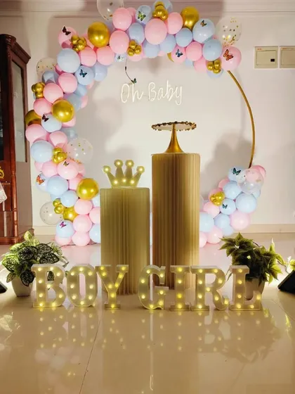 The complete gender reveal party scene, with props and lighting ready for the big announcement.