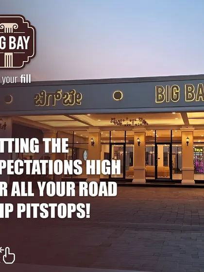 This graphic promises that we are setting the expectations high for all road trip pitstops, with a beautiful dusk shot of our main entrance.