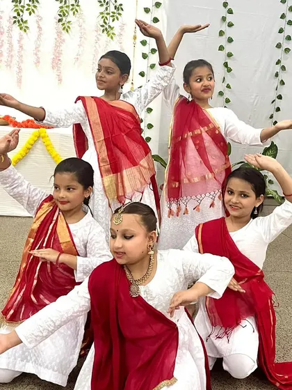 A beautiful pose from our junior Kathak group performance. This photo showcases the coordination and poise our students develop through our structured curriculum.