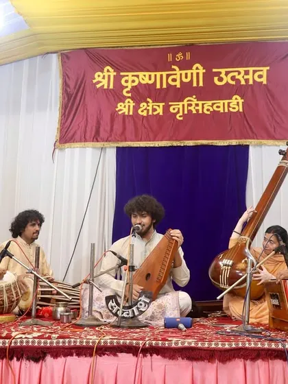 The full ensemble on stage at Shri Kshetra Nrusinhawadi, offering our music as a form of prayer.
