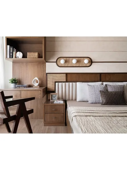 A full view of the parent's bedroom, showing the integrated study desk and custom headboard lighting.
