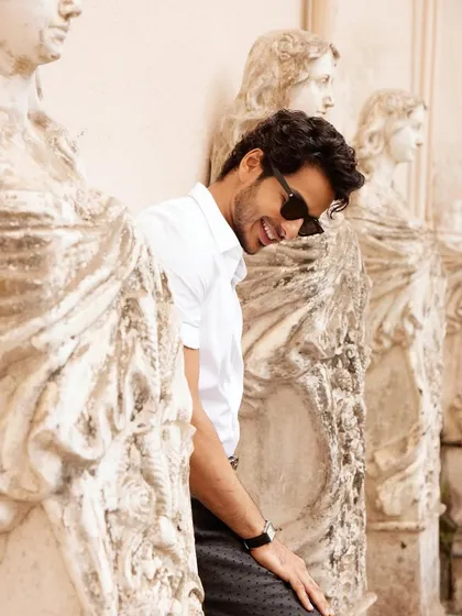A candid, happy moment with Ishaan Khatter during 'The Royals' promo tour. Even in a relaxed shot, the grooming ensures he looks effortlessly cool.