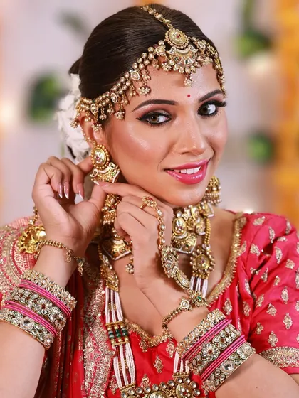 A happy bride is the best review. This image captures the confidence that comes with a perfectly executed makeup look.