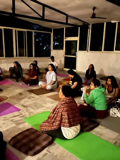 A meditation session during our yoga retreat in Rishikesh. Practicing together in such a peaceful environment helps deepen our collective consciousness.