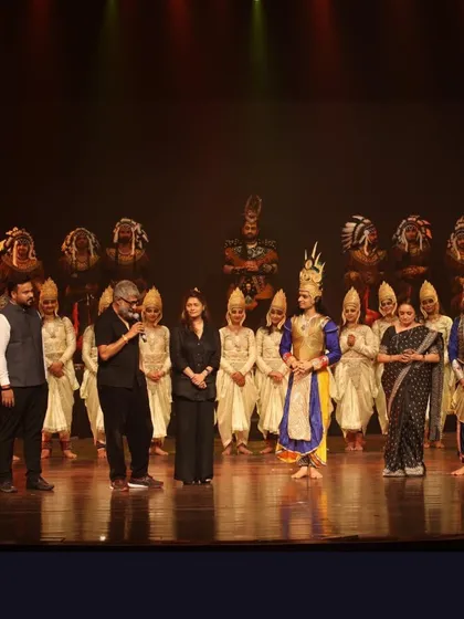 The full cast of '18 Days' on stage. It takes a dedicated army of artists, technicians, and designers to bring a production of this magnitude to life.