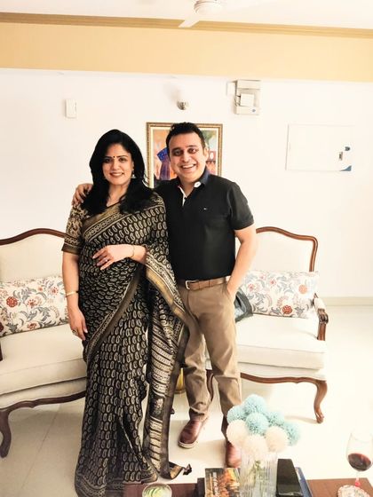 A special moment with my husband during our first get-together at our new home. A classic saree is always my choice for creating beautiful memories.