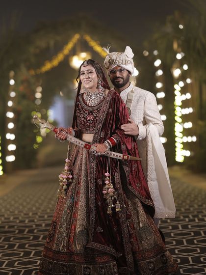A beautiful wedding portrait of the happy couple. Her makeup was designed to be timeless and elegant, with a focus on glowing skin that looked perfect both in person and on camera.