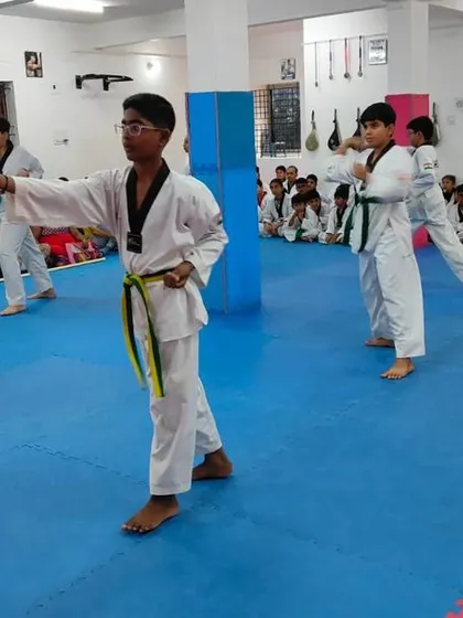 Students practicing their punches during a form.