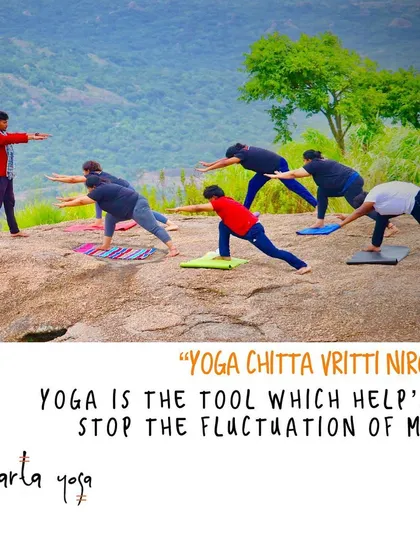 "Yoga Chitta Vritti Nirodha" means yoga is the tool to quiet the fluctuations of the mind. Here, I am leading a session on a mountaintop, helping students connect their breath and movement to the stillness of nature. This practice helps build focus and find a stable, balanced mind.