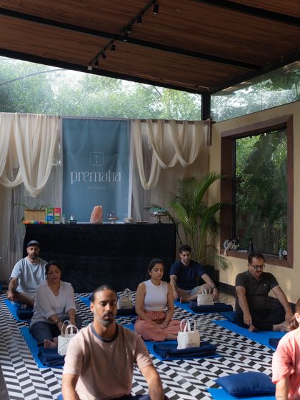 Our community sitting in meditation at the Premaha workshop. The space is set up to be serene and supportive, allowing each person to go inward.