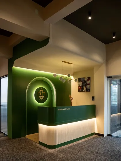 This is the reception of my own studio, the heart of Goodu. I used our signature deep green, curved forms, and layered lighting to create a welcoming entrance that immediately communicates our brand's commitment to sophisticated and thoughtful design.