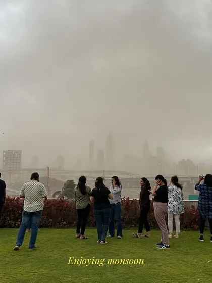 The team enjoying a monsoon storm from our office terrace. Moments like these, appreciating the power and beauty of nature, often inspire our work and reinforce our commitment to designing with the environment in mind.
