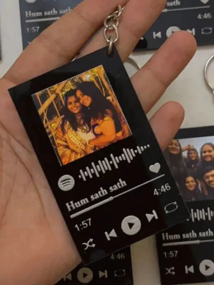 Carry your favorite song and memory with you everywhere. These custom acrylic keychains feature your photo and a scannable Spotify code.