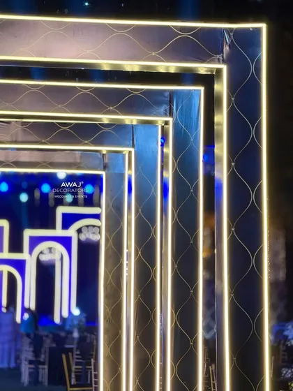 A close-up of the modern, illuminated entrance arches, featuring a sleek design with integrated lighting.