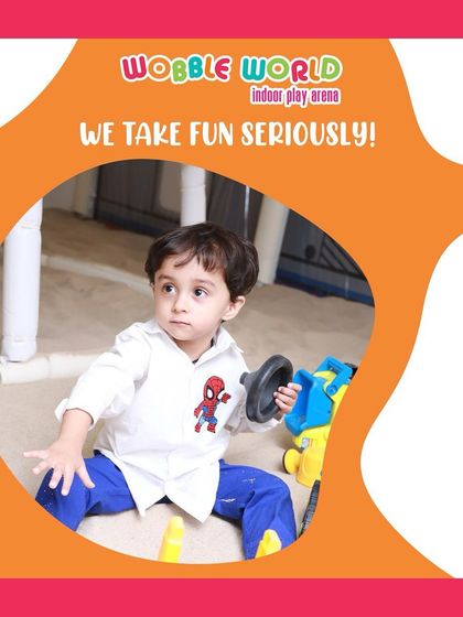 We take fun seriously, even for our littlest visitors. This toddler is enjoying the construction toys in our safe and clean sand play area.