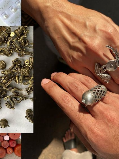 Trying on unique, oversized rings from a street vendor selling antique and handcrafted jewelry.