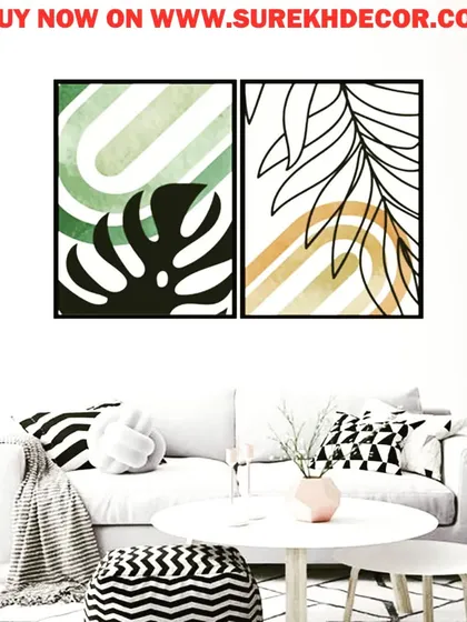 A vibrant set of two framed prints that mix tropical leaf silhouettes with colorful geometric backgrounds. This artwork is perfect for adding a bold and modern touch to a living room or office.