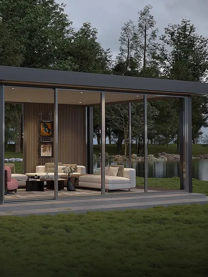 An identical view to the previous, this image reinforces the serene setting and the seamless integration of the modern structure within a natural, waterside landscape.
