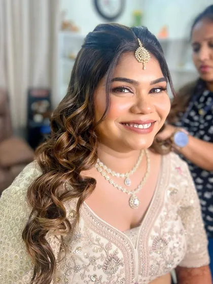 A behind-the-scenes shot of the engagement glam. The final look is a testament to the artistry and care I put into every client.