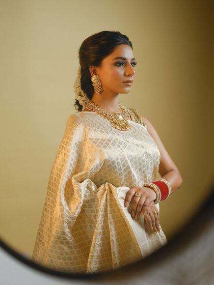 Another perspective of this versatile look, showing how the makeup and styling come together to create a sophisticated and traditional aesthetic.