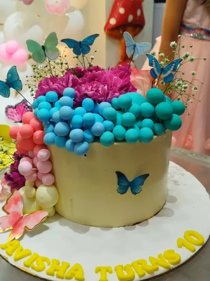 A close-up of the stunning butterfly-themed cake for Avisha's 10th birthday. We coordinate with amazing bakers to ensure every detail of your party is perfect.